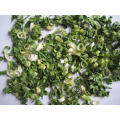 Dehydrated spring onion rolls or flakes